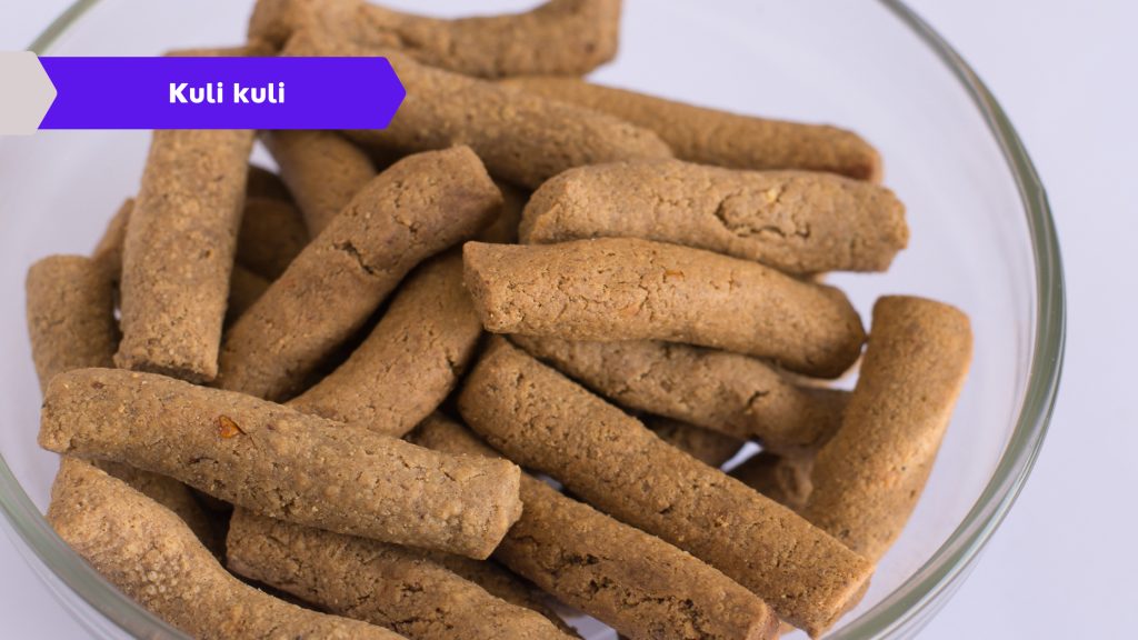 Kuli kuli is a popular street food in Nigeria often enjoyed as a snack or as an accompaniment to other dishes. It is often shaped into small balls or cylinders and can be fried or roasted.