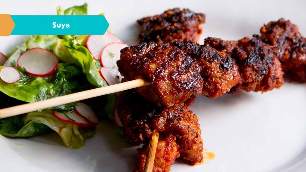 SUYA is often served with onions and tomatoes and is a staple at street food markets in Nigeria