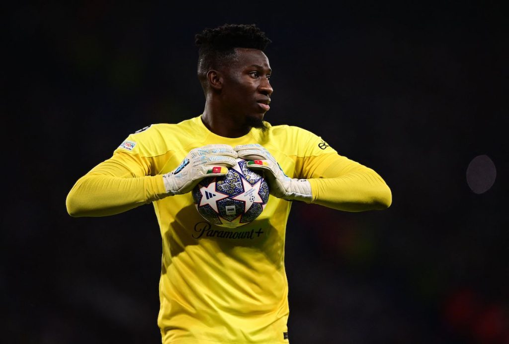 Andre Onana, one of the exceptional African football stars and goalkeeper, poised and ready to make a save during a game.
