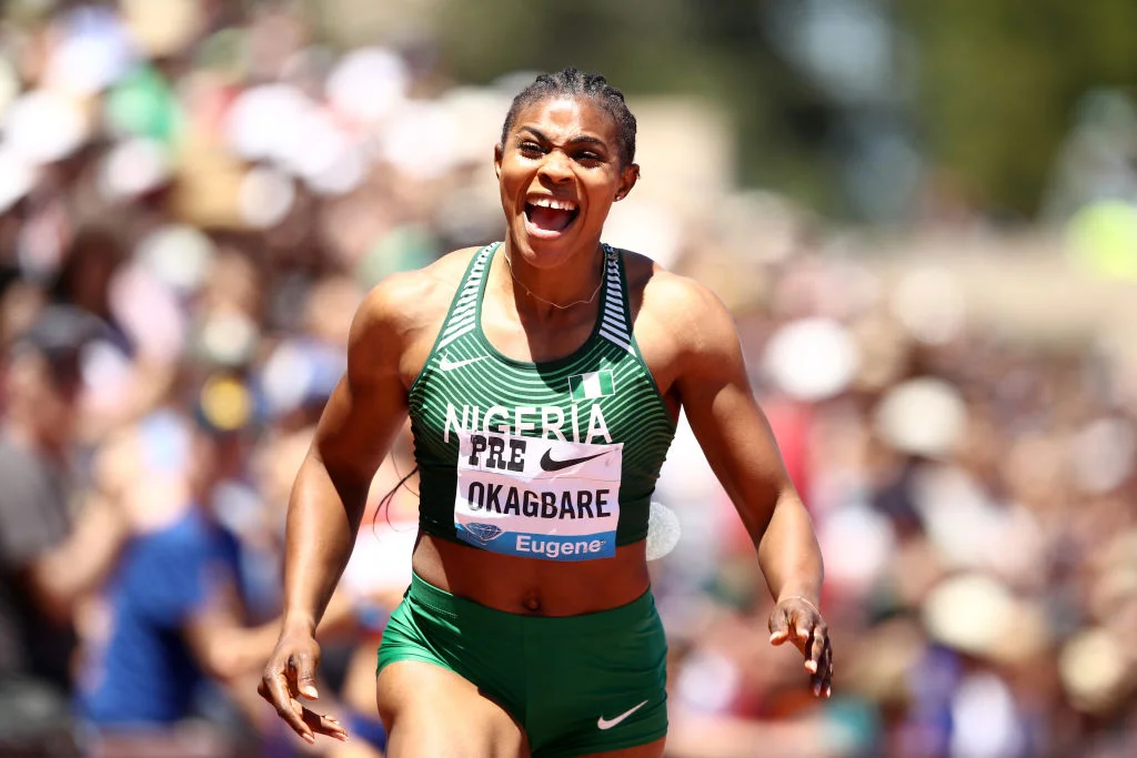 Blessing Okagbare, a top Nigerian female athlete, sprinting to victory in a track and field event.